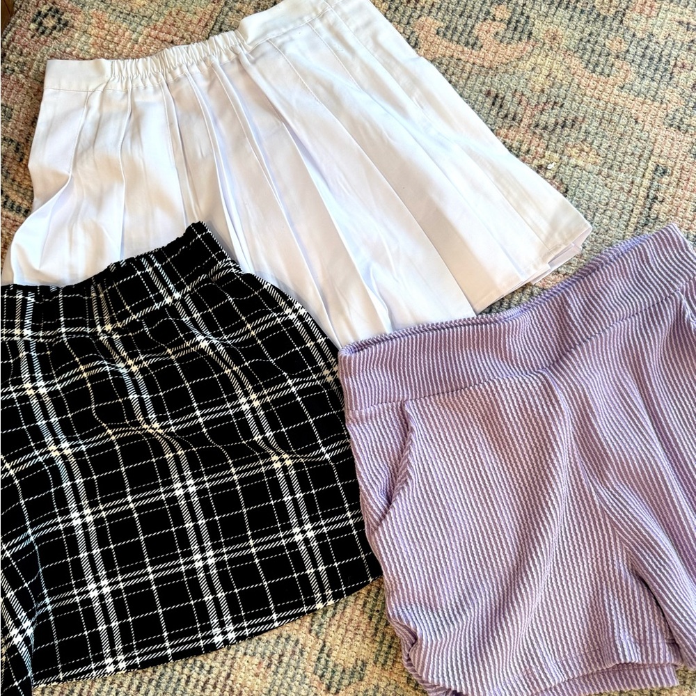 Bundle of 2 skirts and purple shorts